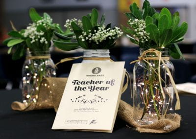 Teacher of the Year decorations: program booklet with mason jar vases